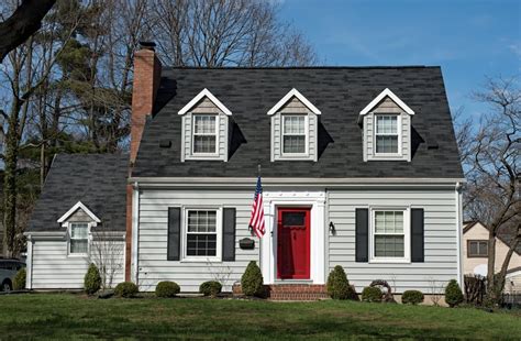 red metal roof grey house|gray house with red trim.